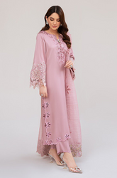 Elegant pink suit adorned with detailed embroidery, highlighting fine craftsmanship and a stylish design.